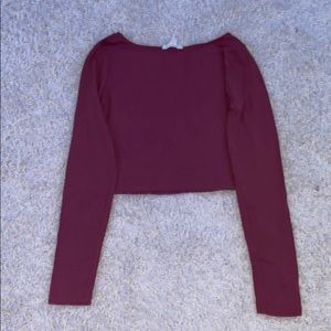 A cropped long sleeved